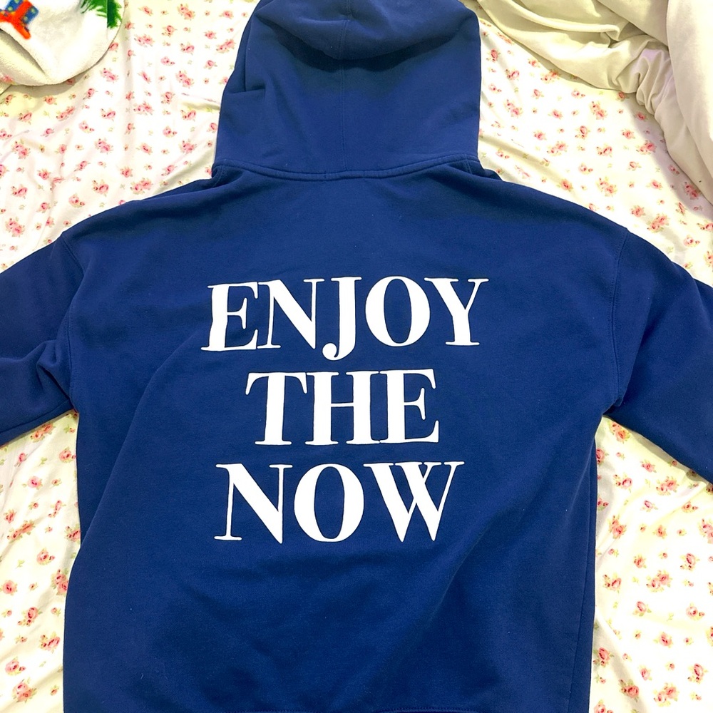 Blue zip up hoodie with white detailing